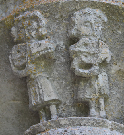 stone carvings of nyckelharpa players